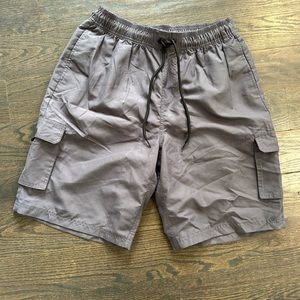 Men’s medium swim trunks TSLA. Brand new never worn. Tags removed